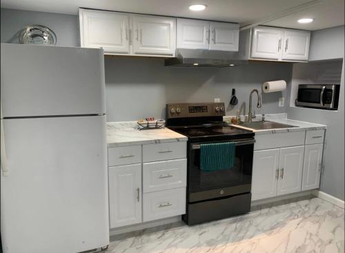 A Cozy Corner with kitchen and parking