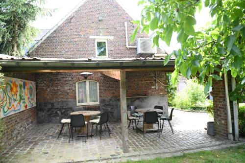 Dārzs, Vakantiewoning Nijkenhof in Vollezele