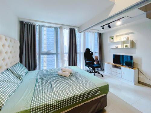 1 BR Cozy unit Uptown Parksuites BGC, Манила