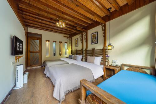 Twin Room with Garden View room in Lijiang Cotton Qiqi Boutique Inn