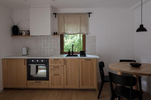 Leśne Chatki - Apartamenty Świerk i Sosna