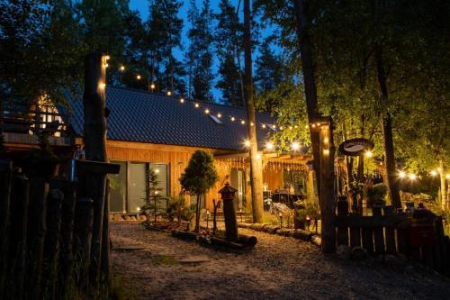 Exterior view of Lesniczowka na Kaszubach - Apartament do 12 osob, balia na wylacznosc