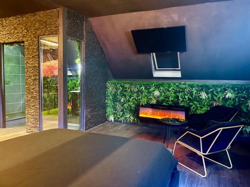 La Suite Oh la la - Duplex Jungle & Jacuzzi Privé (La Suite Oh la la - Duplex Jungle & Jacuzzi Prive) in 斯蒂澤姆奧方內姆