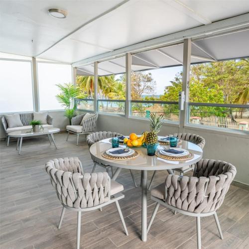 AQUA Terrazas Apt 6 - Beachfront Gem with Ocean Views & Pool in Dorado