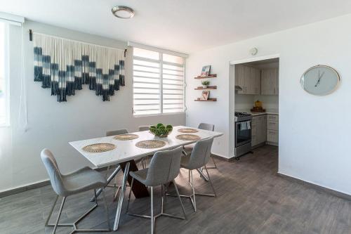 AQUA Terrazas Apt 6 - Beachfront Gem with Ocean Views & Pool in Dorado