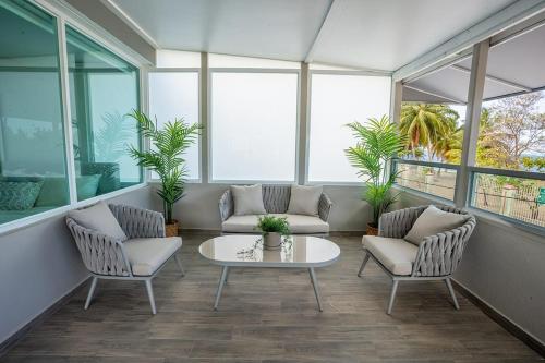 AQUA Terrazas Apt 6 - Beachfront Gem with Ocean Views & Pool in Dorado