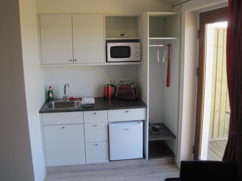 Kitchen, Skogar Sunset Guesthouse in Husavik