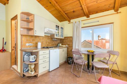 virtuve, Apartments by the sea Igrane, Makarska - 24626 in Igrane