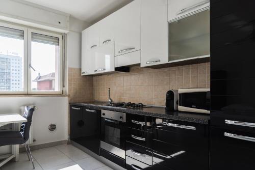 virtuve, Youhosty - San Raffaele Comfort Flat in Quartiere Adriano