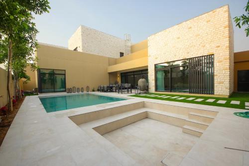 Silk Valley - Al Jurf Luxury 4BR with private pool and steps away from Beach in Ghantoot