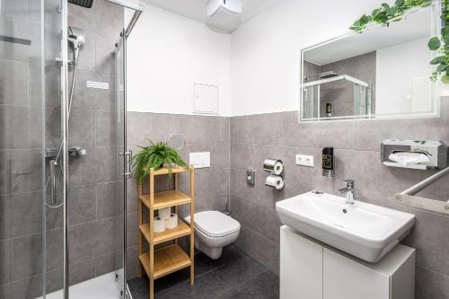 حمام, BrockHeus Black Style Apartment I Küche I Zentral I Parkplatz (BrockHeus Black Style Apartment I Kuche I Zentral I Parkplatz) in Magdeburg City Center