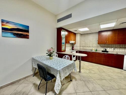 Motor City Norton Court Parking Pool near Dubai Studio City