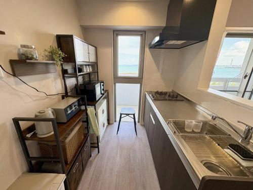 Kitchen, Crest Blue 401-オーシャンフロント! 新築マンション! in Kin