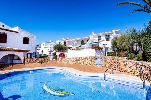 Villa Las violetas with 2 communal pools - image 3