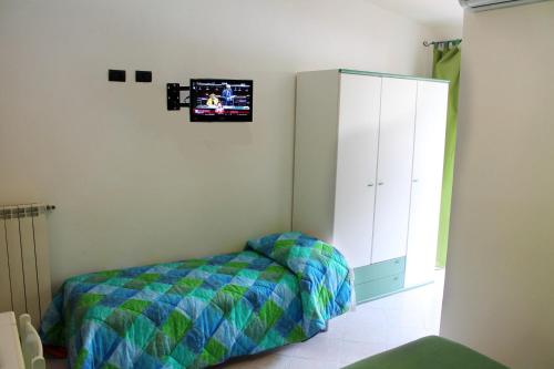 Quadruple Room with Balcony (2 Adults + 2 Children)