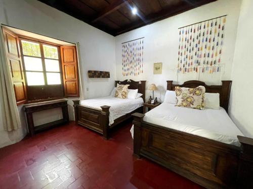Quadruple Room with Private Bathroom room in Hostal Antigüeño