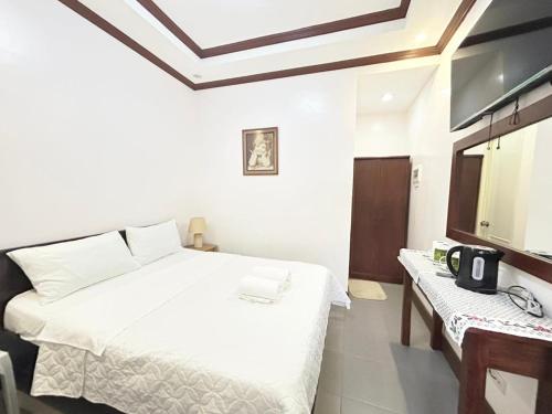 세부 Caliah Homes Apartelle 3성급 게스트하우스 스위트룸