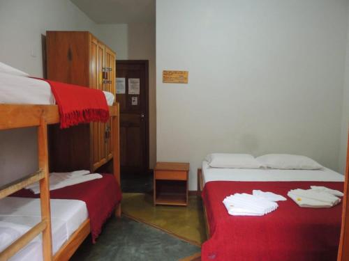 Quadruple Room with Private Bathroom room in O Pharol Hostel e Pousada