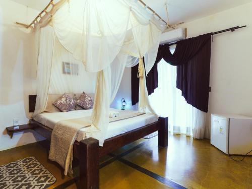 Quarto Standard room in VELINN Pousada Bali Itamambuca
