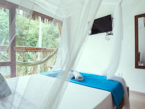 Quarto Luxo room in VELINN Pousada Bali Itamambuca