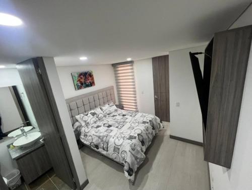 Three-Bedroom Apartment room in Apartamento amoblado Edificio Avanzzare T1-601