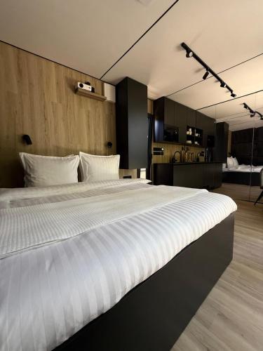 Spiegelhuisje aan zee in นิวฮัมสเตเดอ