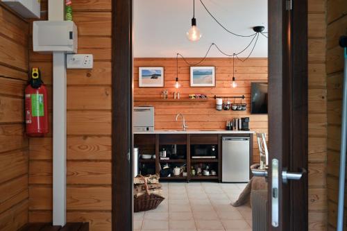 Romantic cozy house Kirzacinas pirts with sauna close to seaside in Skulte