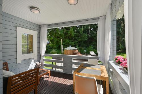 Balkons/terase, Romantic cozy house Kirzacinas pirts with sauna close to seaside in Skulte