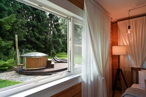 Viesnīcas āriene, Romantic cozy house Kirzacinas pirts with sauna close to seaside in Skulte