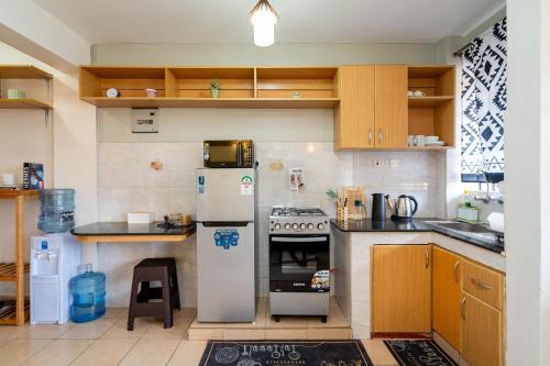 مطبخ, The Cozy Corner 1BR in Westlands near Sarit Centre in سبرينج فالي