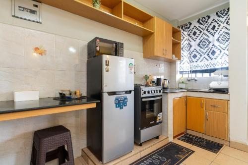 مطبخ, The Cozy Corner 1BR in Westlands near Sarit Centre in سبرينج فالي