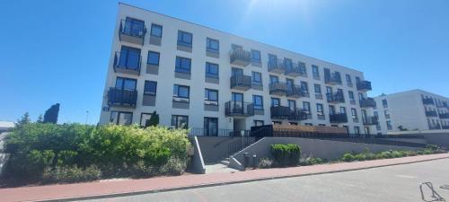 Зовнішній вигляд готелю, Apartment 20 minutes from Warsaw with Balcony by Noclegi Renters in Олтажев