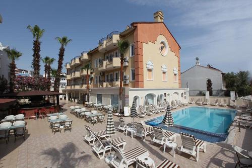 Fidan Apart Hotel The 3-star Fidan Apart Hotel offers comfort and convenience whether youre on business or holiday in Marmaris. Both business travelers and tourists can enjoy the hotels facilities and services. 24-ho