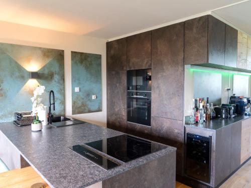 Apartment Penthouse Deluxe Galerie 2 stockig by Interhome in Parkvillage Seethurn