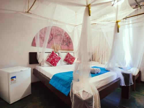 Quarto Junior room in VELINN Pousada Bali Itamambuca