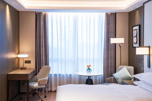 Yuexiu Hotel Guangzhou,Curio Collection by Hilton-Free shuttle between hotel and Exhibition Center during Canton Fair & Exhibitor Registration Counter