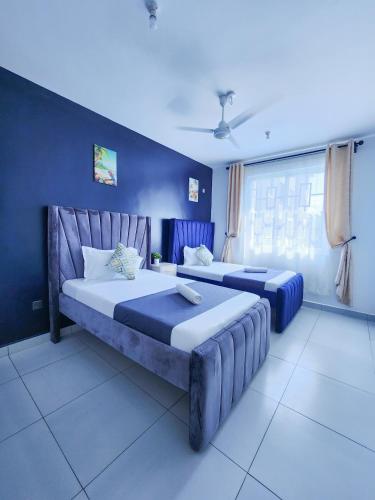 Three Bedroom Apartment Nyali 4 beds,pool and walking distance to the beach in شاطئ نيالي
