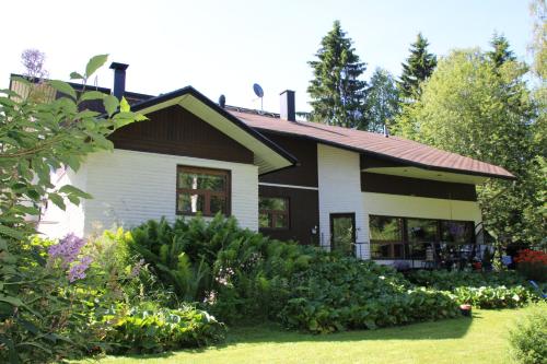 Atmospheric house on riverbank