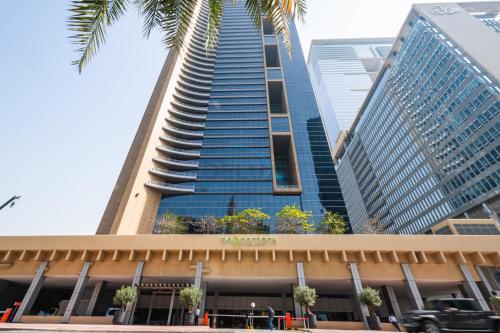 Iconic Views of the Future Museum, Minutes from Metro & Key Attractions, Sky Gardens, DIFC by Deluxe Holiday Homes, Dubai (foto 6)