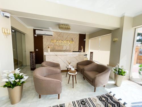AKHNATON Pyramids View Hotel With Rooftop Access & free airport pickup in Haram