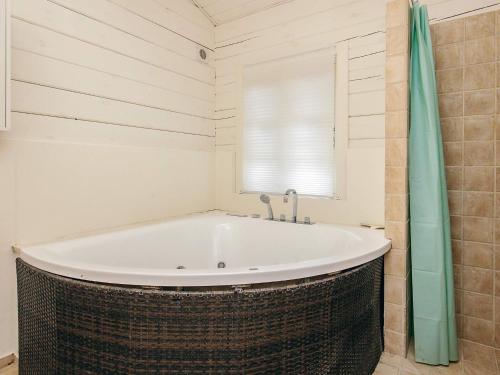 Spa, 4 star holiday home in Væggerløse in Vaeggerlose