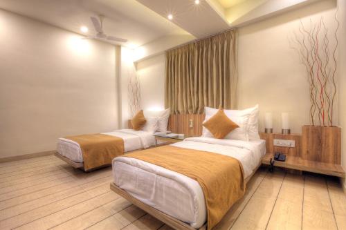 Scenaria Hotel Scenaria Hotel is a popular choice amongst travelers in Ahmedabad, whether exploring or just passing through. The property offers a wide range of amenities and perks to ensure you have a great time. S