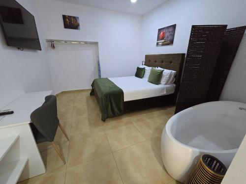 Poet Palace Bucharest Room Type - Room 2 Deluxe double en-suite with freestanding bath, 1 car parking space