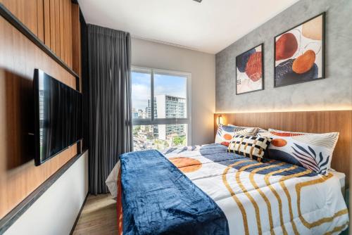 Apto executivo na Faria Lima - varanda, WiFi, ar-cond e garagem - Okaeri Home, São Paulo