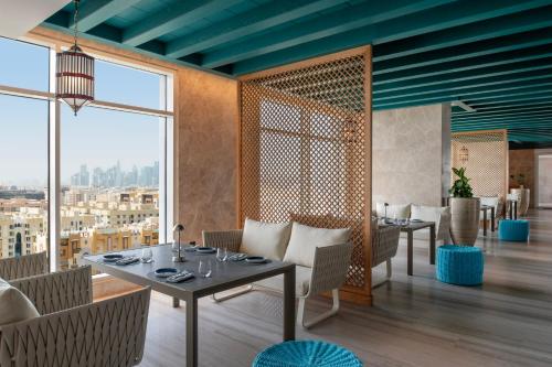 Restaurant, Abesq Doha Hotel & Residences, an IHG Hotel By IHG in Al Jadeed / Al Nasr