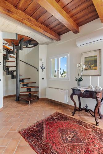 Incantevole villa con piscina e giardino a poca distanza dalle spiagge piu belle in กิอูซา ดี การ์โล