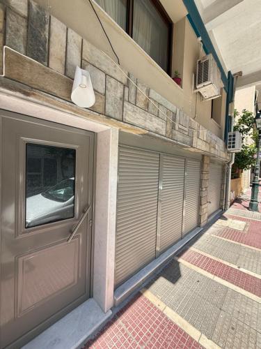 Зовнішній вигляд готелю, Cosy Apartment on Mpoleti in Лутракі