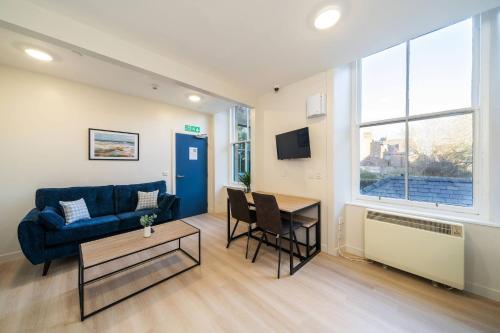 ห้องส่วนกลางสำหรับนั่งเล่น/ดูทีวี, Isla at Ben More Apartments in โมนโทรด