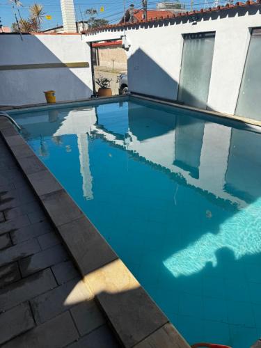 No Centro com Piscina Aquecida solar