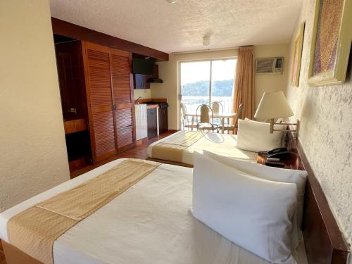 Habitación 2 camas, vistas al océano